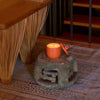 ROEN Candles Fushimi Scented Candle (8 oz) - product shown on wooden stool. 