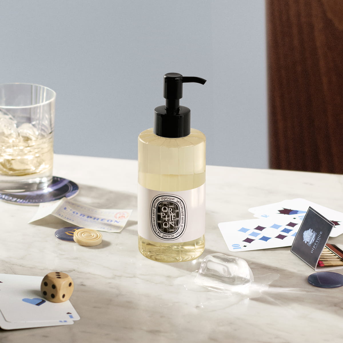 Diptyque Orpheon Perfumed Cleansing Body Gel (200 ml) - product shown on counter.