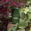 Sidebalm The Outside Balm (20 g) - product shown on step with leaves around. 