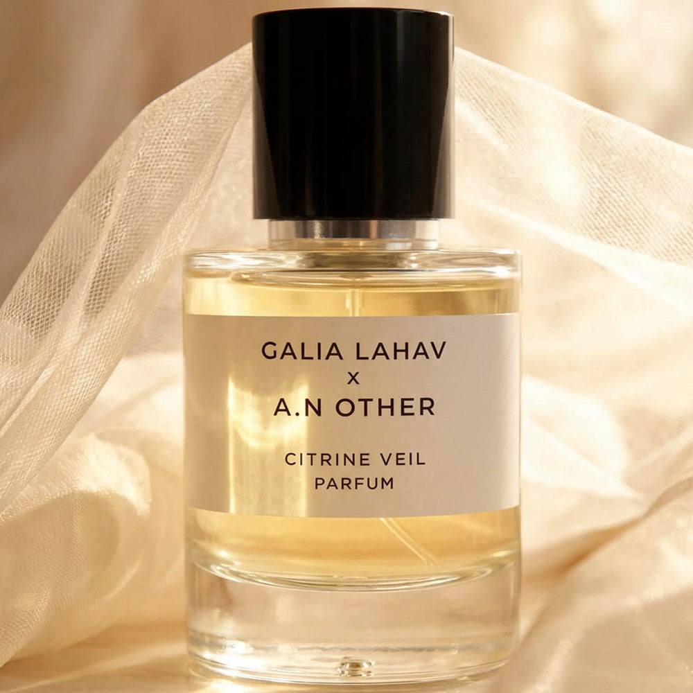 Lifestyle shot of A. N. OTHER x Galia Lahav Citrine Veil Parfum (50 ml) with white veil in the background