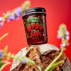 Sky High Farm Goods Strawberry Jam (8 oz) - product shown on top of rock. 