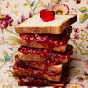 Sky High Farm Goods Strawberry Jam (8 oz) - product shown on sandwhich. 