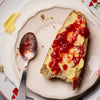 Sky High Farm Goods Strawberry Jam (8 oz) - product shown on butter toast. 
