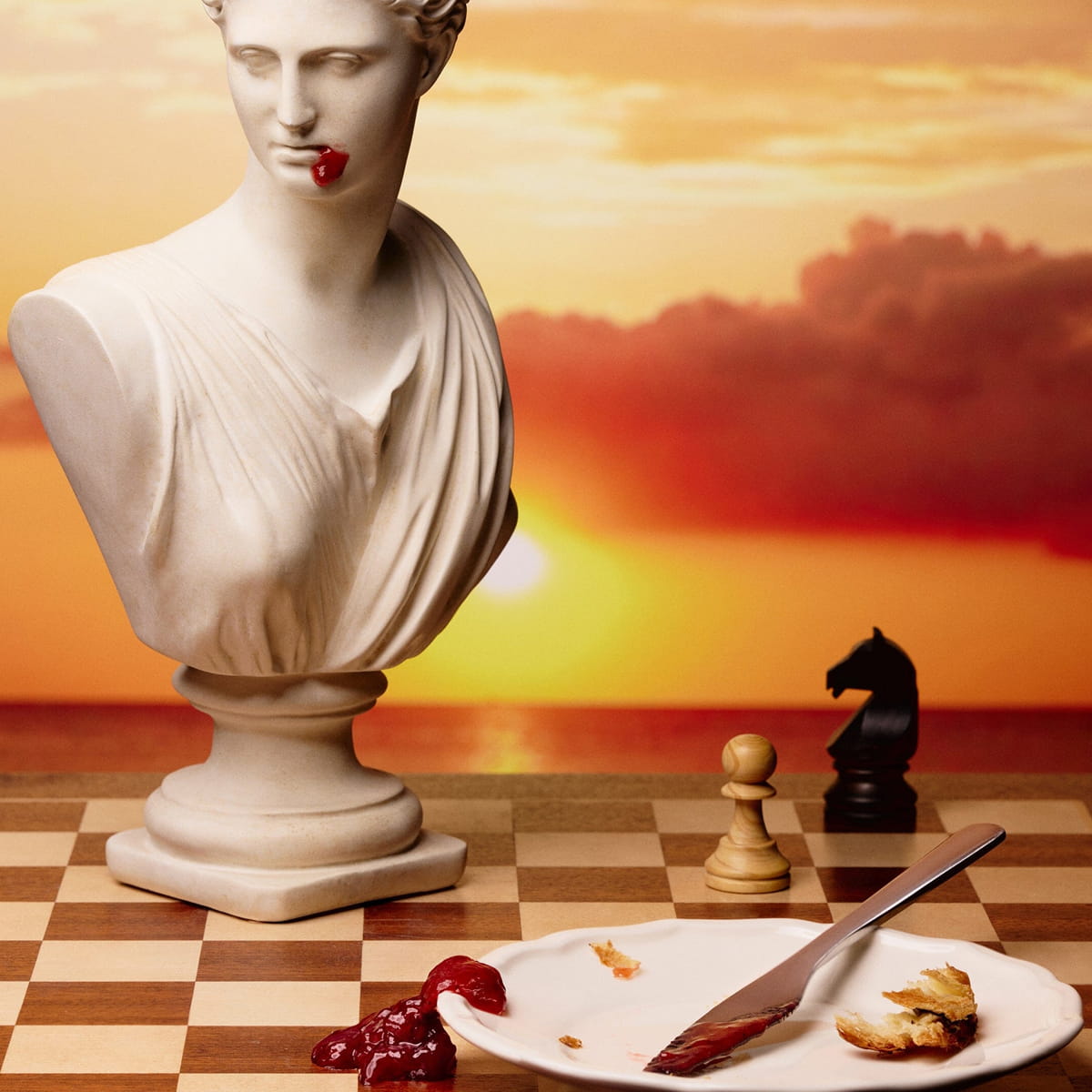 Sky High Farm Goods Strawberry Jam (8 oz) - product shown on chess board. 