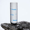Freaks of Nature Barrier Balancing Cleanser (3.4 oz) on a rock with a white background