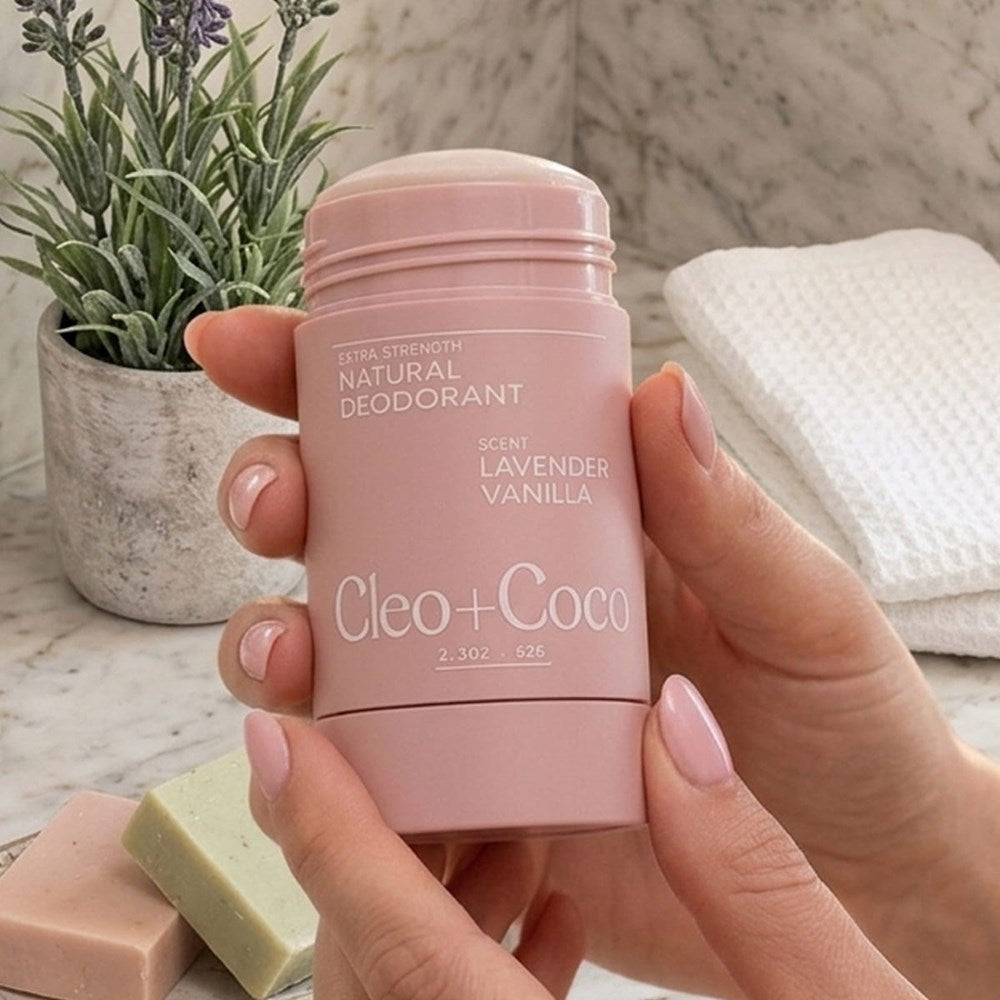 Cleo+Coco Extra Strength Deodorant - Lavender Vanilla (62 g) - product shown close up with bathroom in background. 