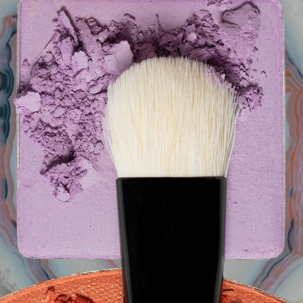 Karolin Van Loon Secret Shadow Brush (1 pc) - product shown in pan of eyeshadow. 
