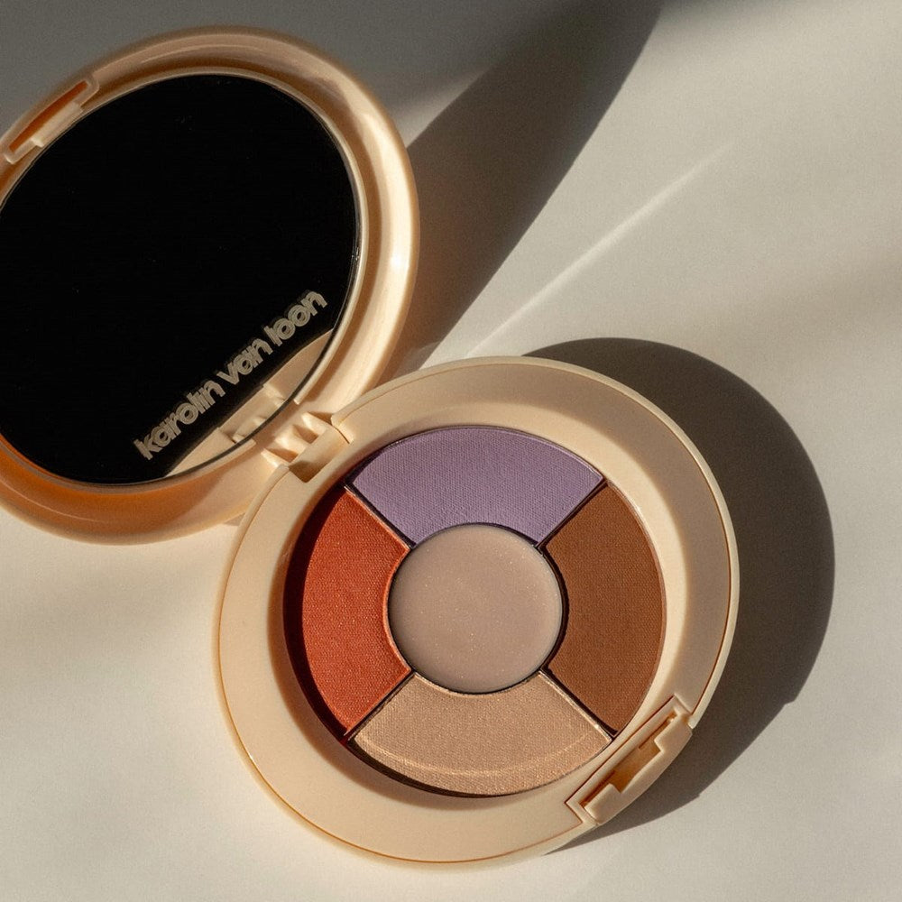 Karolin Van Loon Dolce Vita Eyeshadow &amp; Highlighter Palette (7.2 g) - product shown on table. 