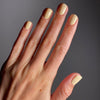 Karolin Van Loon Nail Polish - 52 Beurre Soleil (15 ml) - product shown applied to nails.