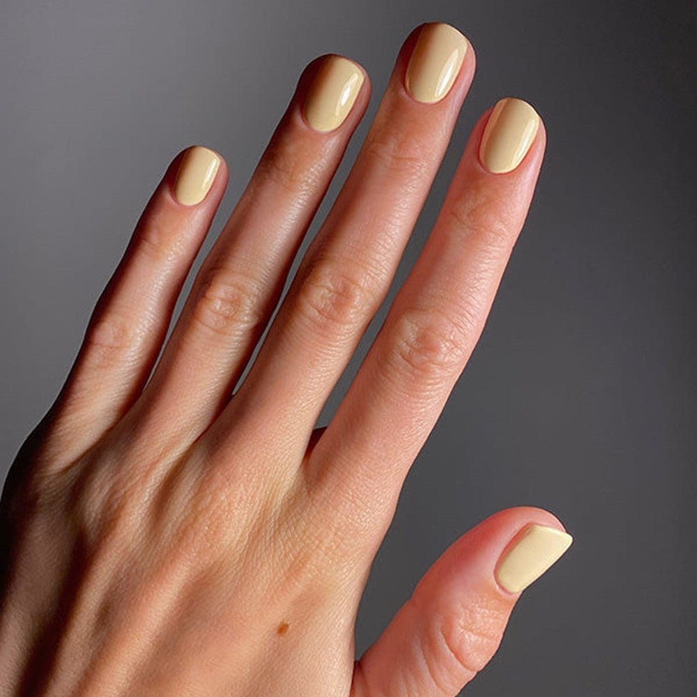 Karolin Van Loon Nail Polish - 52 Beurre Soleil (15 ml) - product shown applied to nails.