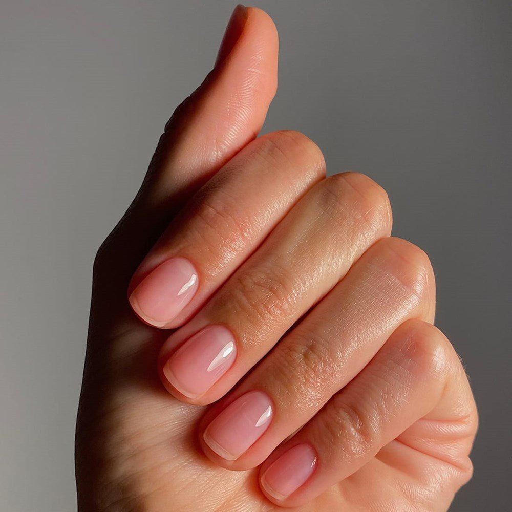 Karolin Van Loon Nail Polish - 56 Hydra Glow (15 ml) - product shown on nails. 