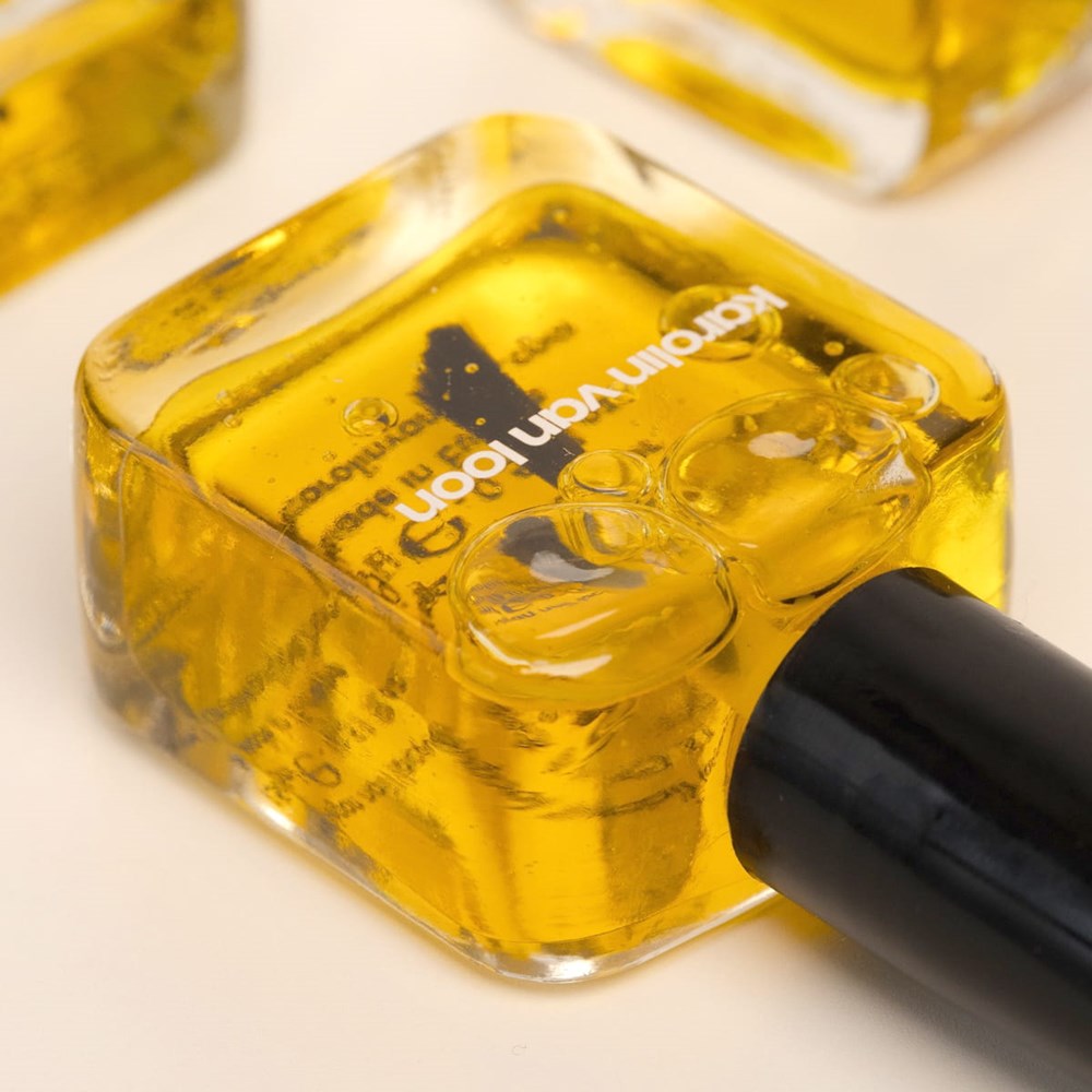Karolin Van Loon Nail Polish - 27 Nail Nectar (15 ml) - product shown on counter.