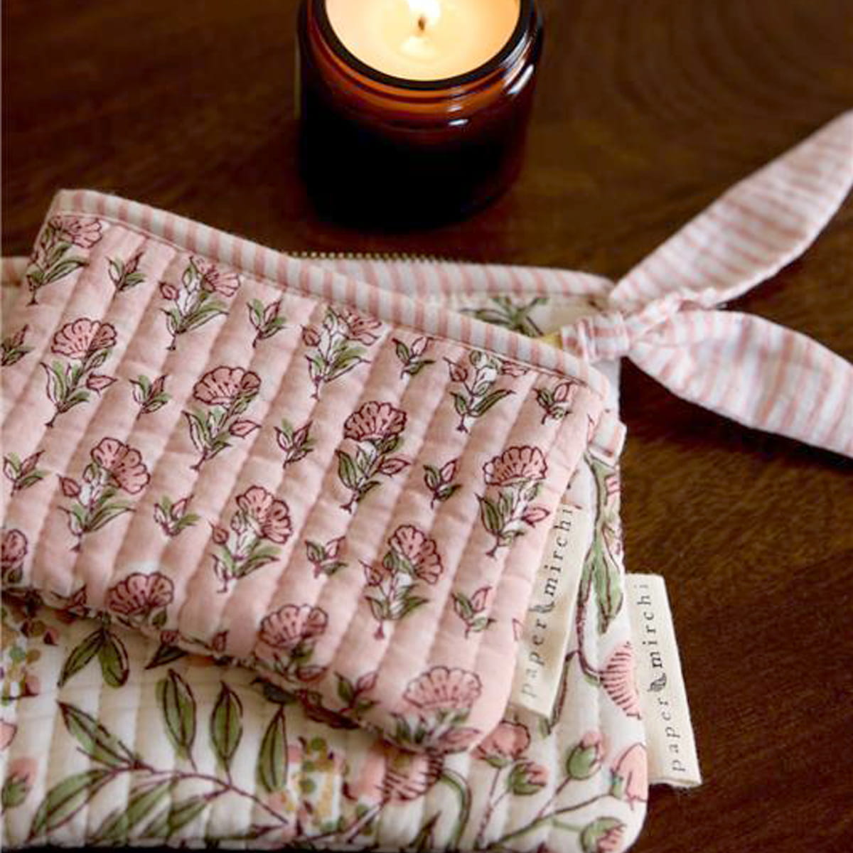 Paper Mirchi Organic Cotton Pouch Set - Floral Blush (2 pcs) - product shown on wooden counter. 