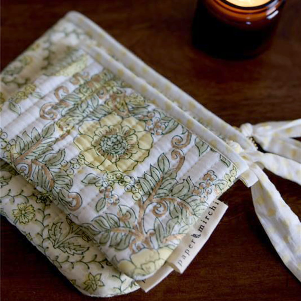 Paper Mirchi Organic Cotton Pouch Set - Floral Buttercream (2 pcs) - product shown on wooden counter. 