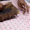 Paper Mirchi Tissue Box - Ditsy Floral Blush (1 pc) - product shown being block printed.
