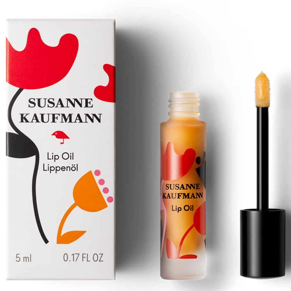 Susanne Kaufmann Lip Oil (5 ml) - product shown next to packaging. 