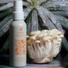 Good Psyche Glisten Up! Hydro Boosting Facial Mist (100 ml) - product shown with mushrooms.