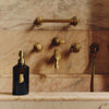 Trudon Carmen Hand Soap (350 ml) - product shown next to faucet. 