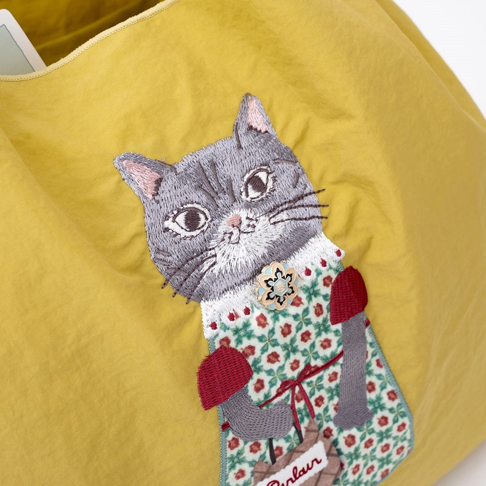 Kusuguru Embroidered Cat Nylon Shoulder Bag - Yellow (1 pc) - product shown up close.