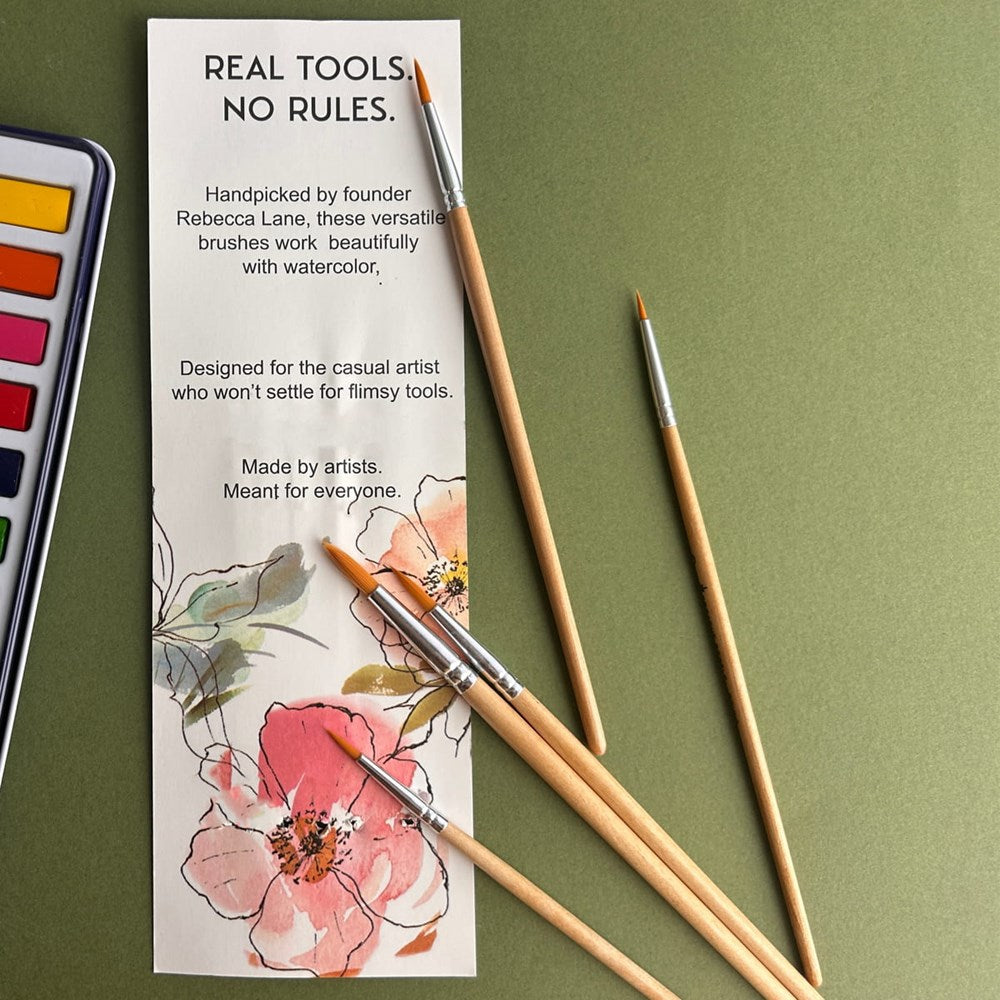 Breathe People Watercolor Paintbrush Set (5 pcs) - product shown on top of packaging and green background. 