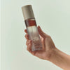 House of Balance 4:00PM Soil Relief Body Mist (100 ml) - product shown being held by hand. 