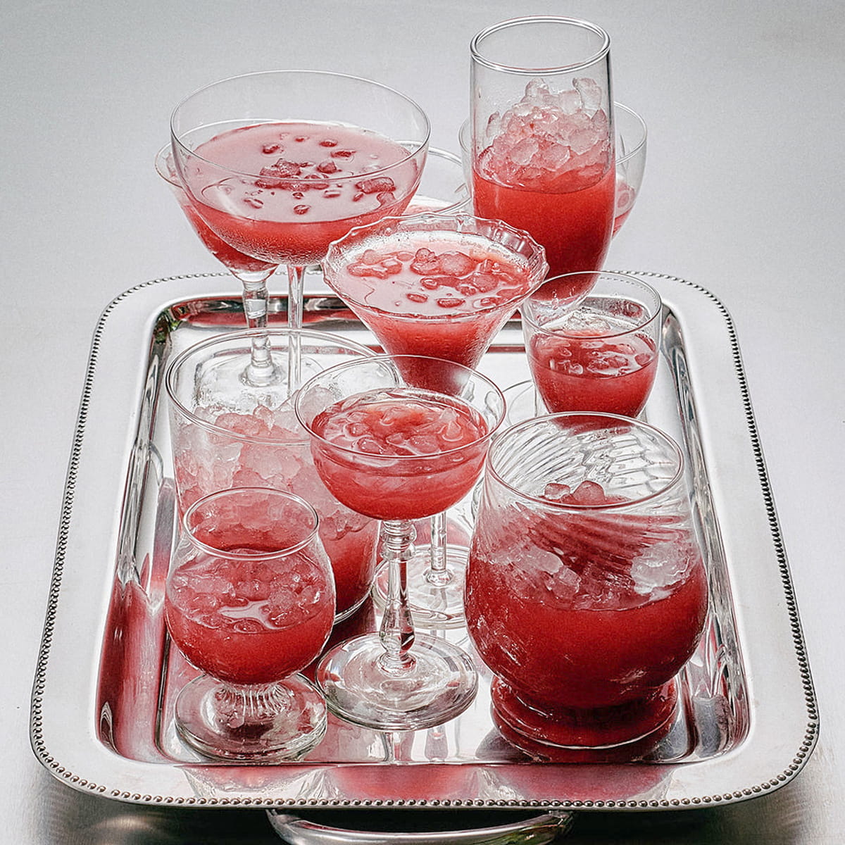 Flamingo Estate Sunny Side Up Recipe Book (1 pc) - pink drinks shown on metal tray. 