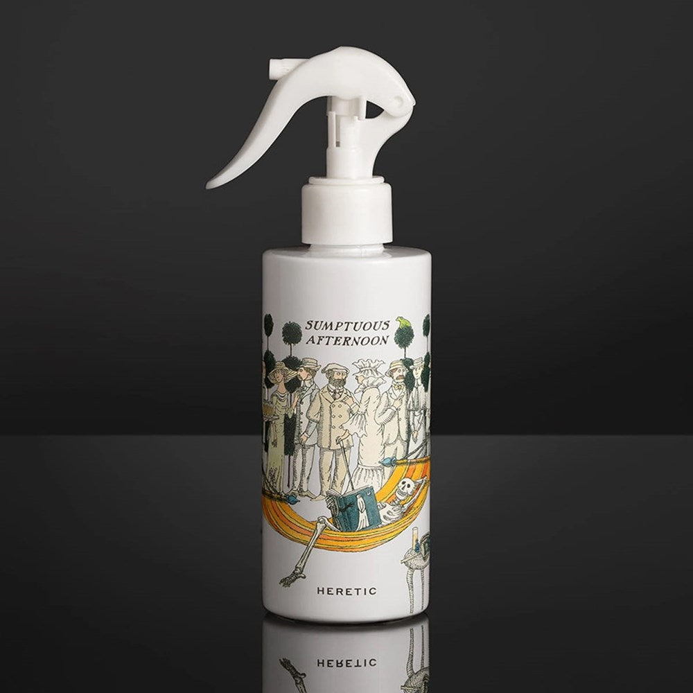 Heretic Parfum Sumptuous Afternoon Room Spray (200 ml) - product shown in front of black background. 