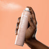 Evian Calm Facial Mist (100 ml) - product shown being sprayed.