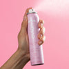 Evian Glow Facial Mist (100 ml) - product shown being sprayed.
