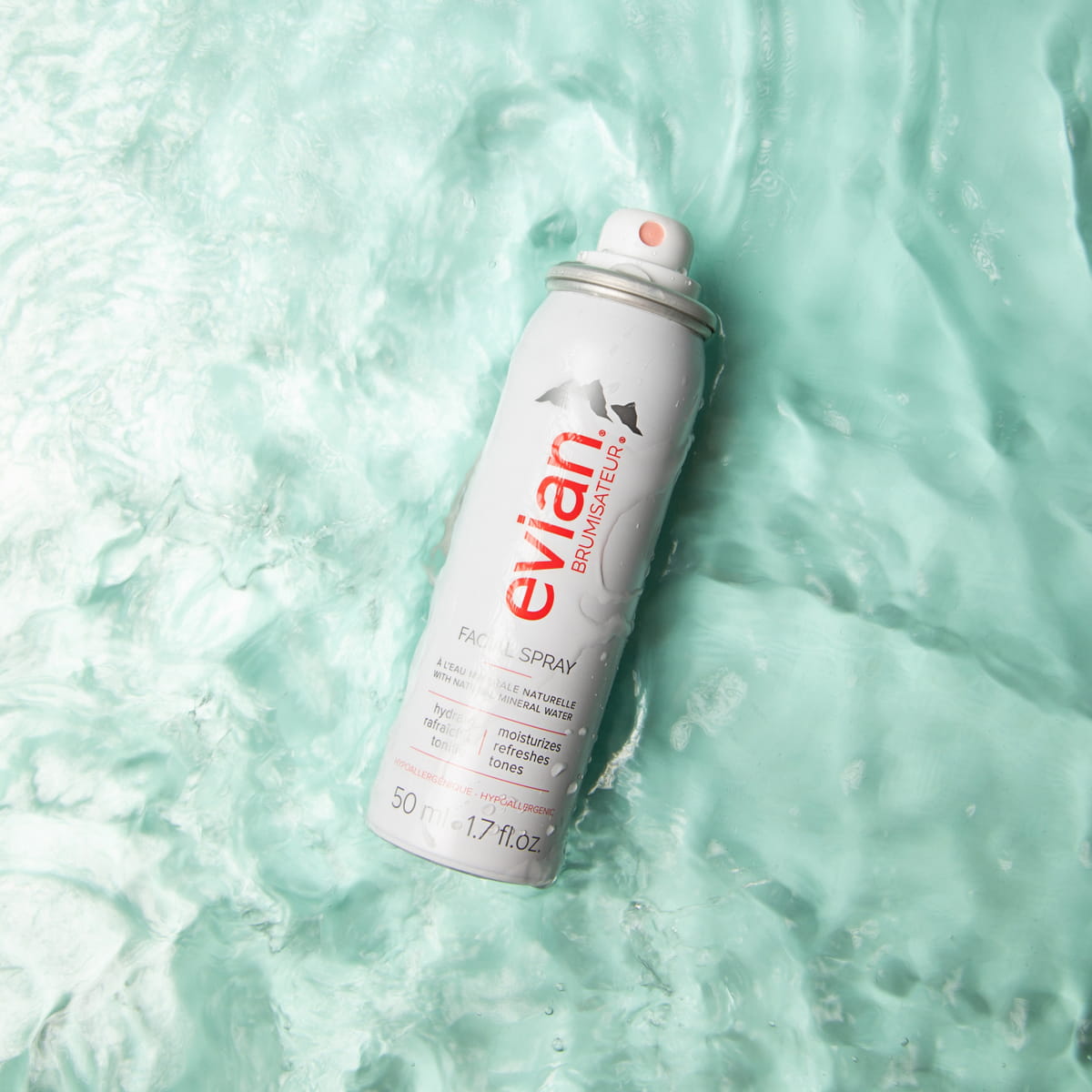 Evian Facial Spray (50 ml) - product shown in water.