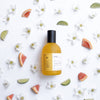 Perfumerica Izamal Eau de Parfum (120 ml) - product shown with fruit and flowers around it.