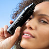 Le Prunier Plum Spritz (60 ml) - product shown being held by model.