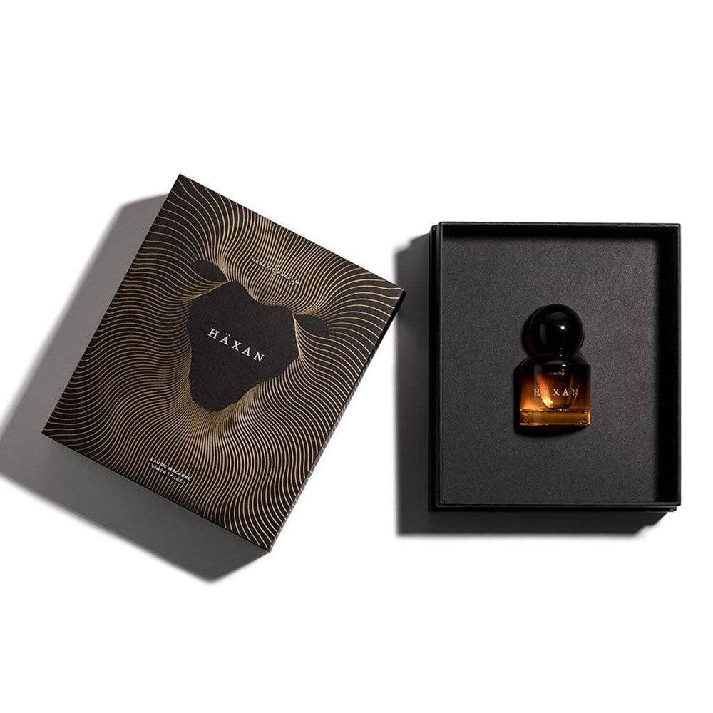 Heretic Parfum Haxan Eau de Macabre (30 ml) - product shown inside of packaging.
