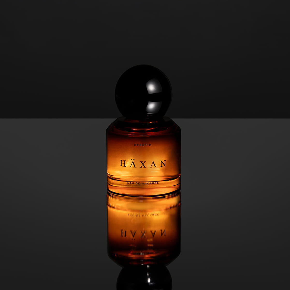 Heretic Parfum Haxan Eau de Macabre (30 ml) - product shown in black background. 