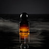 Heretic Parfum Haxan Eau de Macabre (30 ml) - product shown with smoke around it.