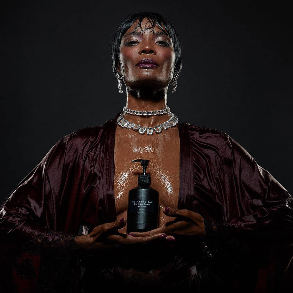 Heretic Parfum Metaphysical Cleansing Body Wash (400 ml) - product shown being held by model. 