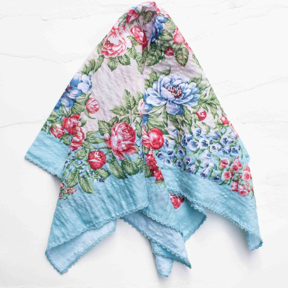 Tiepology Vintage Garden Floral Scarf - Blue (1 pc) - product shown on counter.