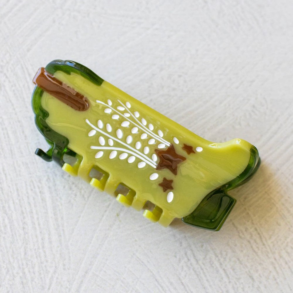 Tiepology Eco Shooting Star Cowboy Boots Hair Claw Clip - Avocado (1 pc) - product shown on counter.