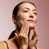 Vintner's Daughter Active Renewal Cleanser (115 ml) - product shown being applied to face.