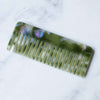 Tiepology Eco Classic Rectangle Hair Comb - Olive Pearl (1 pc) - product shown on marble counter top.