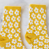 Tiepology Full of Daisy Casual Socks - Mustard (1 pair) - product shown up close.