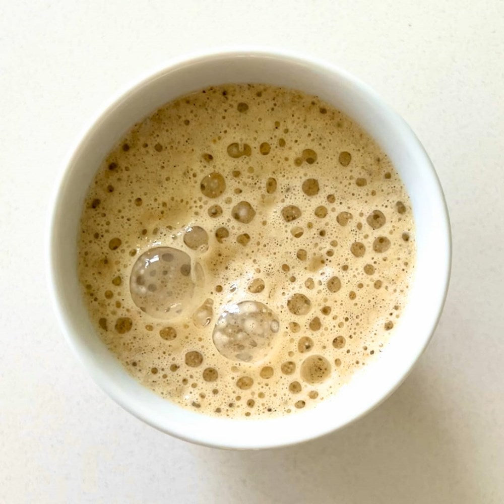 Chand & Radha Mango Ayurvedic Functional Latte Blend (210 g) - product shown in cup.