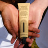 Close up of hands holding Commune Seymour Hand Cream (75 g)