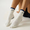 Model wearing Effortless Club Good Energy Grip Socks (1 pair)