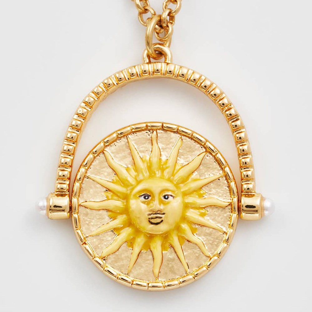 Showing close up of "Day" side of necklace