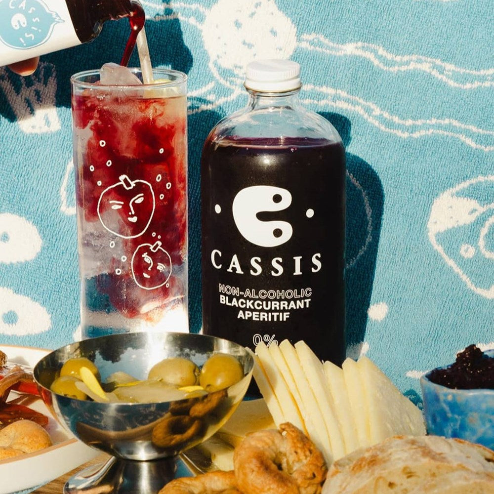 Lifestyle shot of C. Cassis Non-Alcoholic Blackcurrant Aperitif Mini (4 oz)