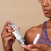 Mayron’s Goods Relief Anti-Chafe Cream (85 g) - product shown being applied to model's shoulder.