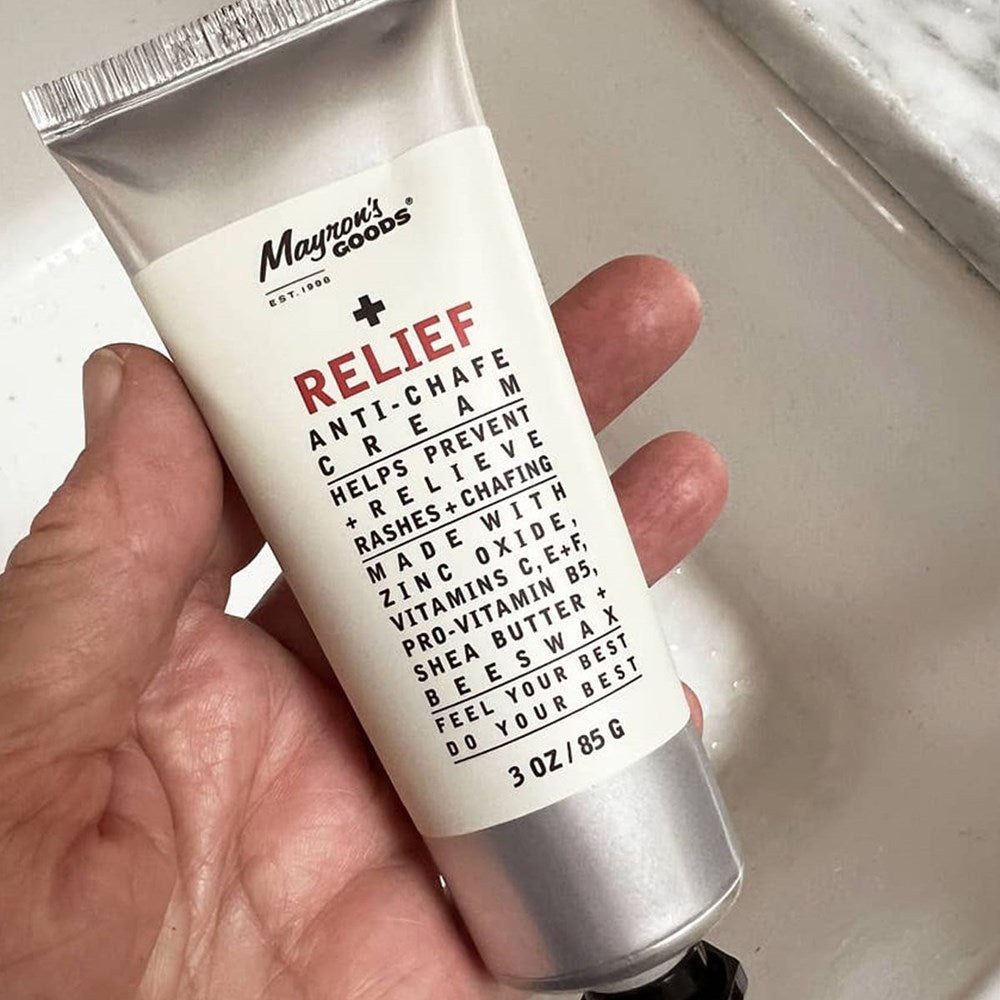 Mayron’s Goods Relief Anti-Chafe Cream (85 g) - product shown being held by hand.