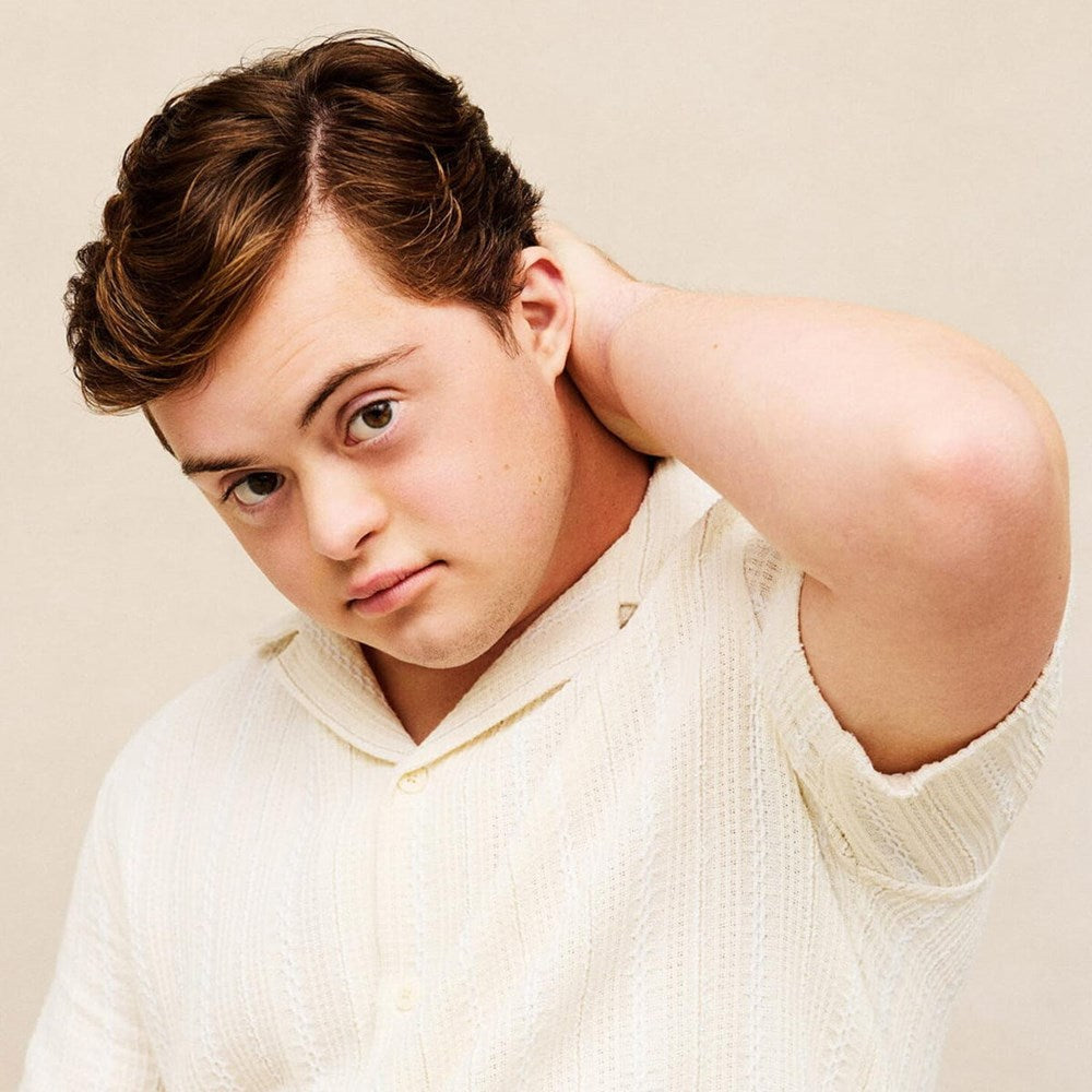 Model of young man with Innersense Organic Beauty Inner Reflection Sculpting Pomade used in hair