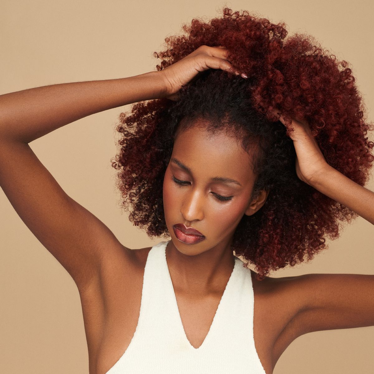 Innersense Organic Beauty Hair Renew Scalp Hairbath - model shown with hands in her hair.